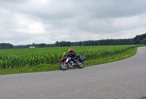 neil pert riding motorcycle photo