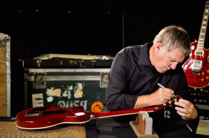 Alex signs one of 50 R40 Les Paul Axcess limited edition guitars