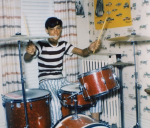 Neil drumming in his bedroom as a child. Courtesy of Neil Peart
